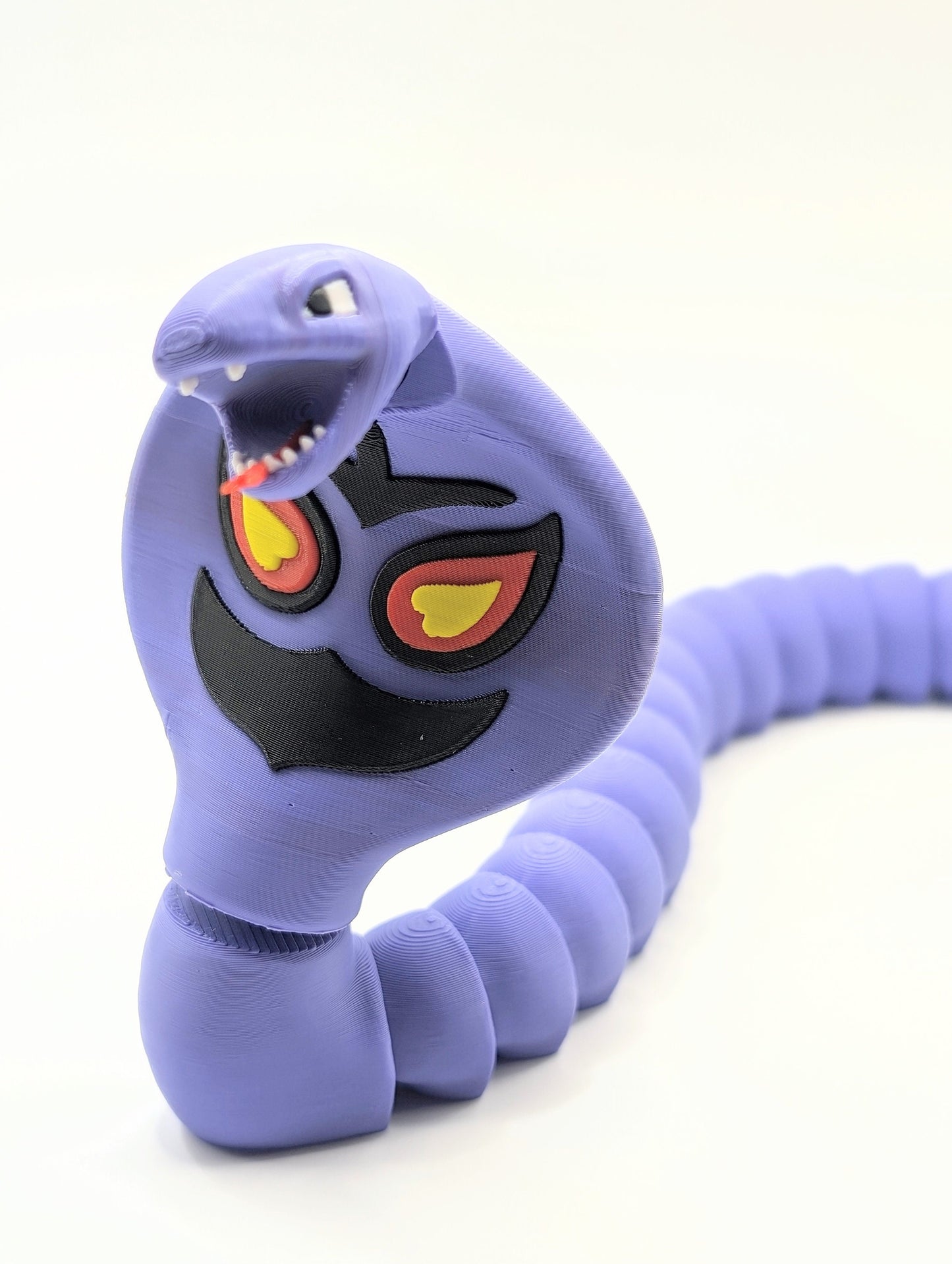 3D printed pokemon Arbok. Articulated fidget, sensory, desk toy.