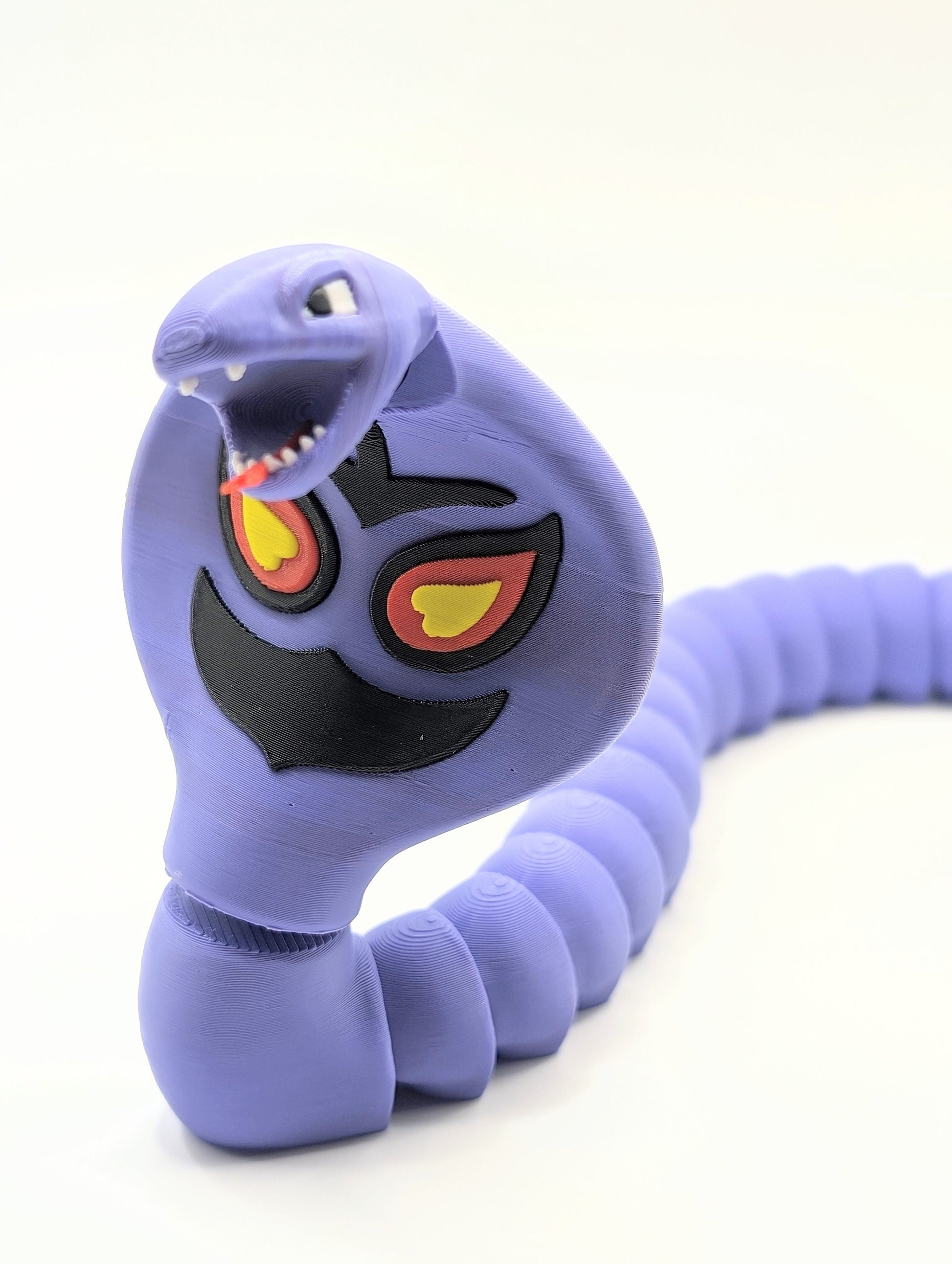 3D printed pokemon Arbok. Articulated fidget, sensory, desk toy.