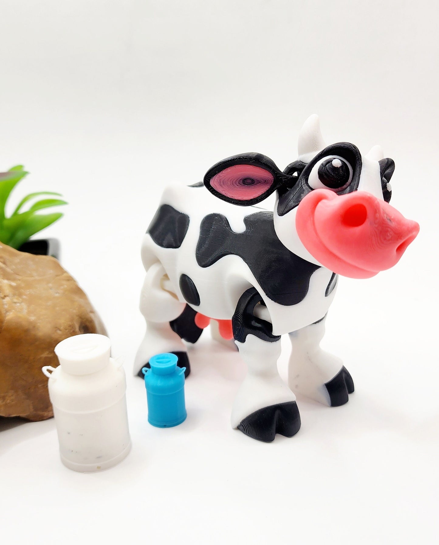 3D printed Milk cow articulated fidget toy. Sensory toy, desk toy.