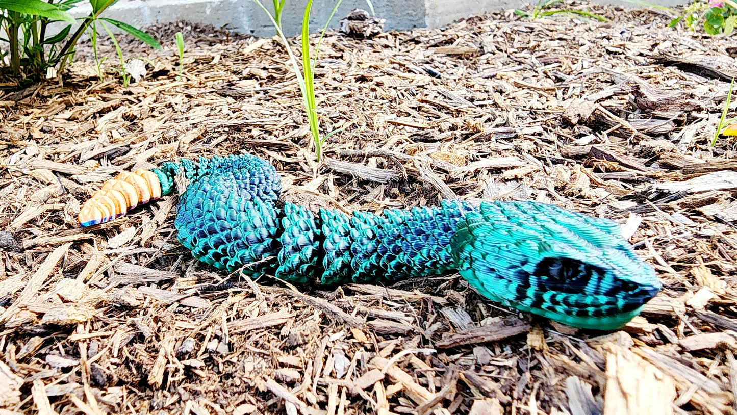 3D printed articulated rattlesnake fidget, sensory toy, desk toy.