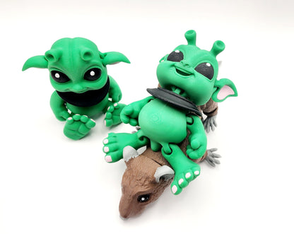 3D printed articulated Alien Baby fidget sensory toy.