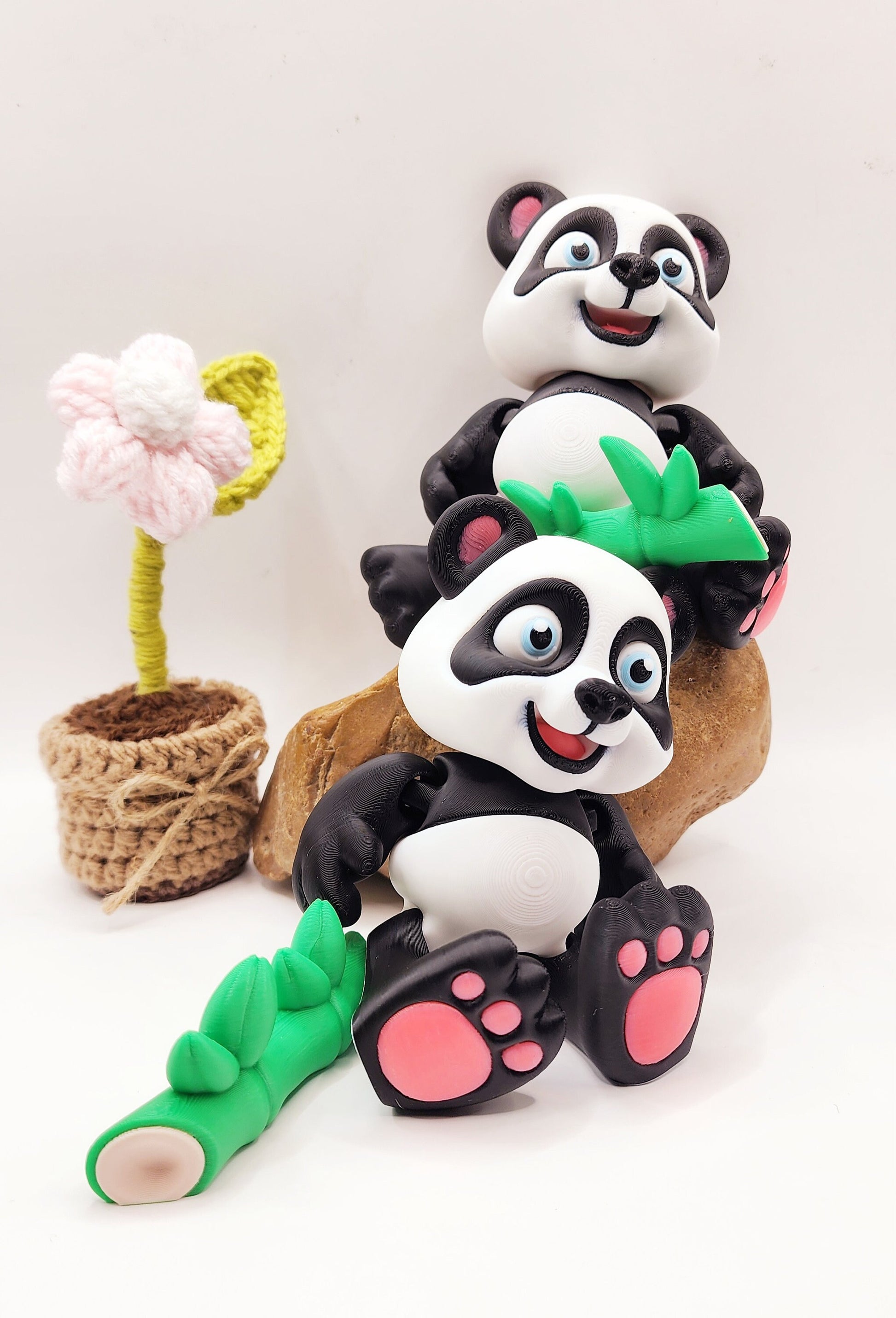 3D Printed articulated flexi baby Panda with bamboo fidget desk toy.