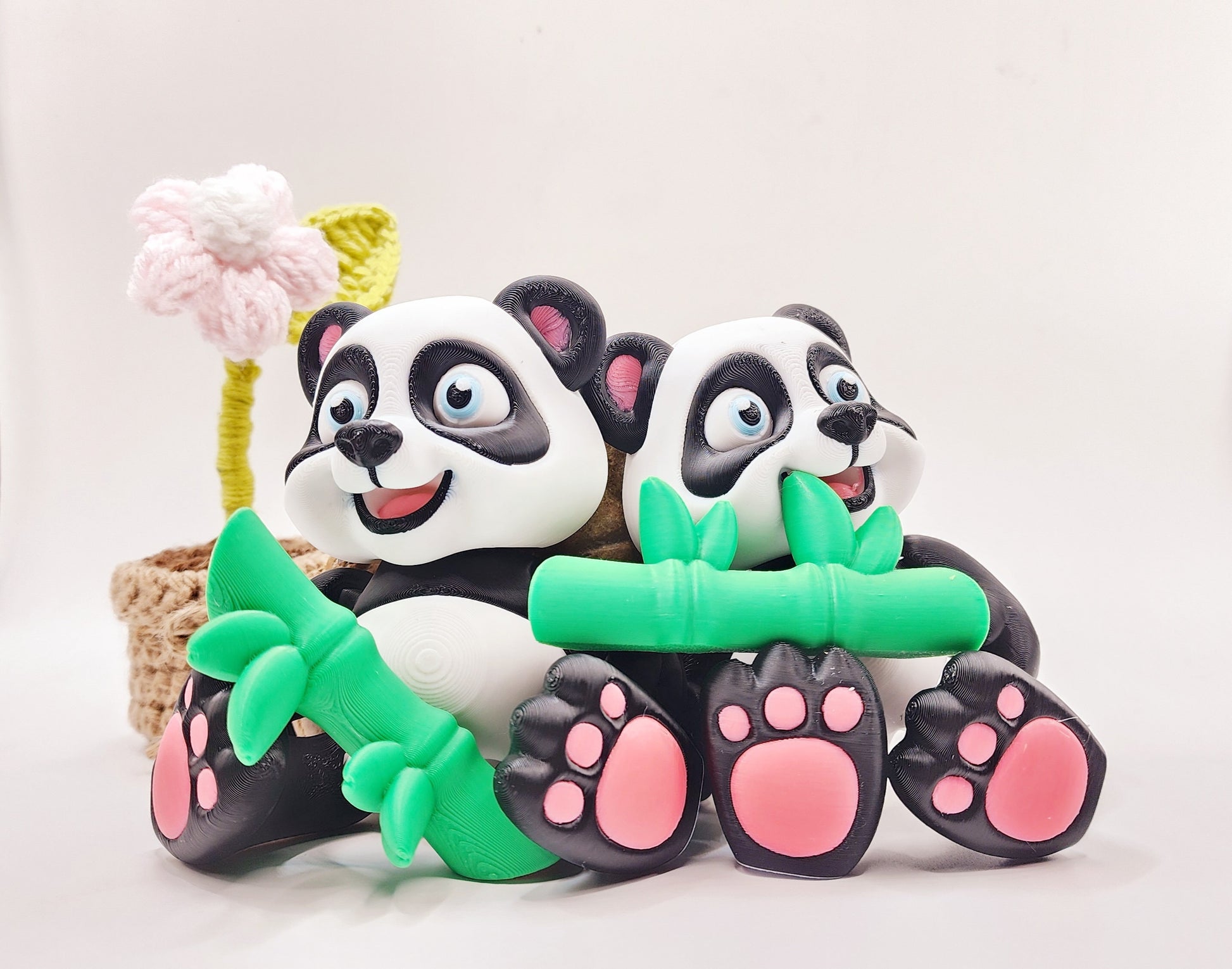 3D Printed articulated flexi baby Panda with bamboo fidget desk toy.