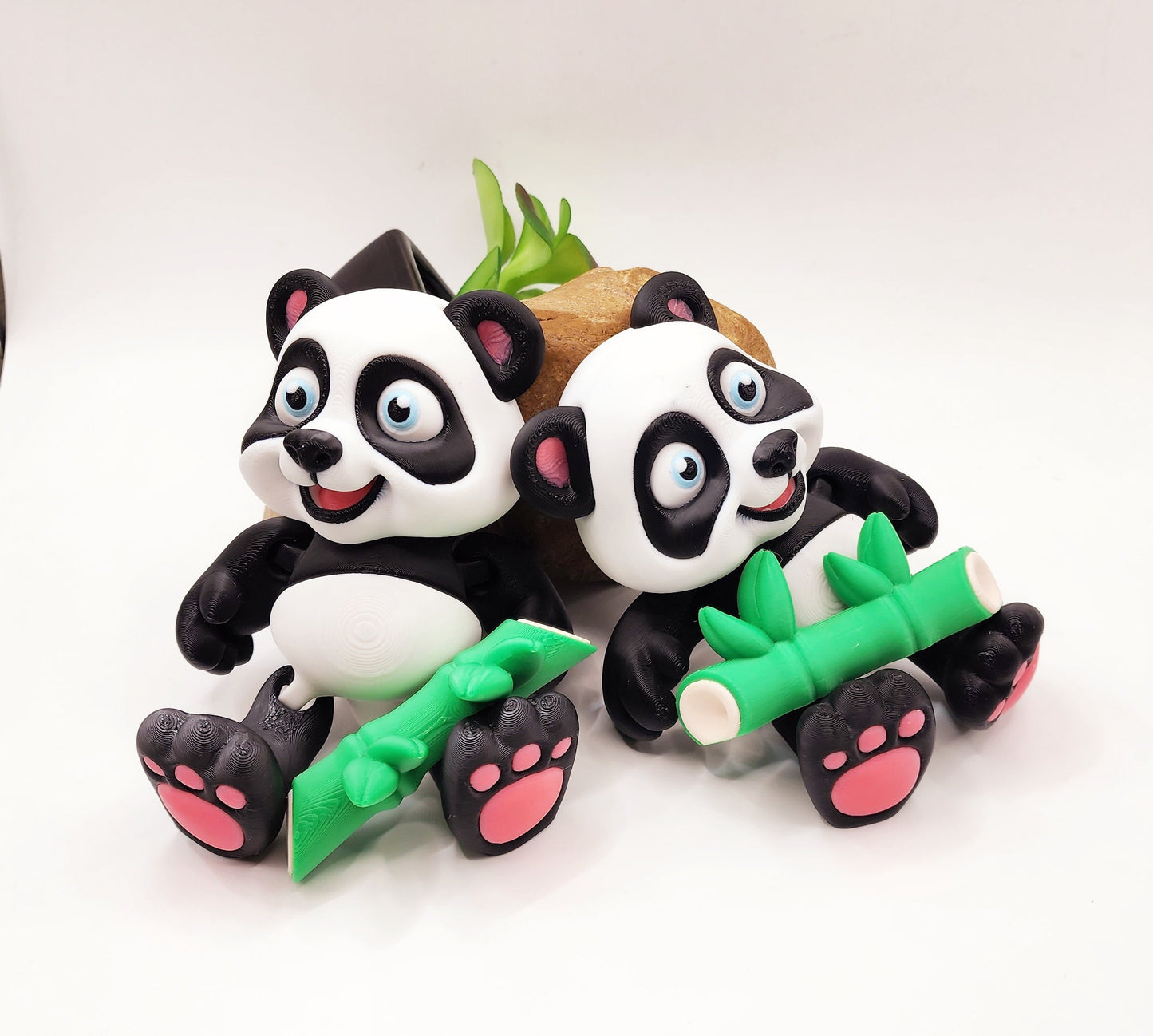 3D Printed articulated flexi baby Panda with bamboo fidget desk toy.