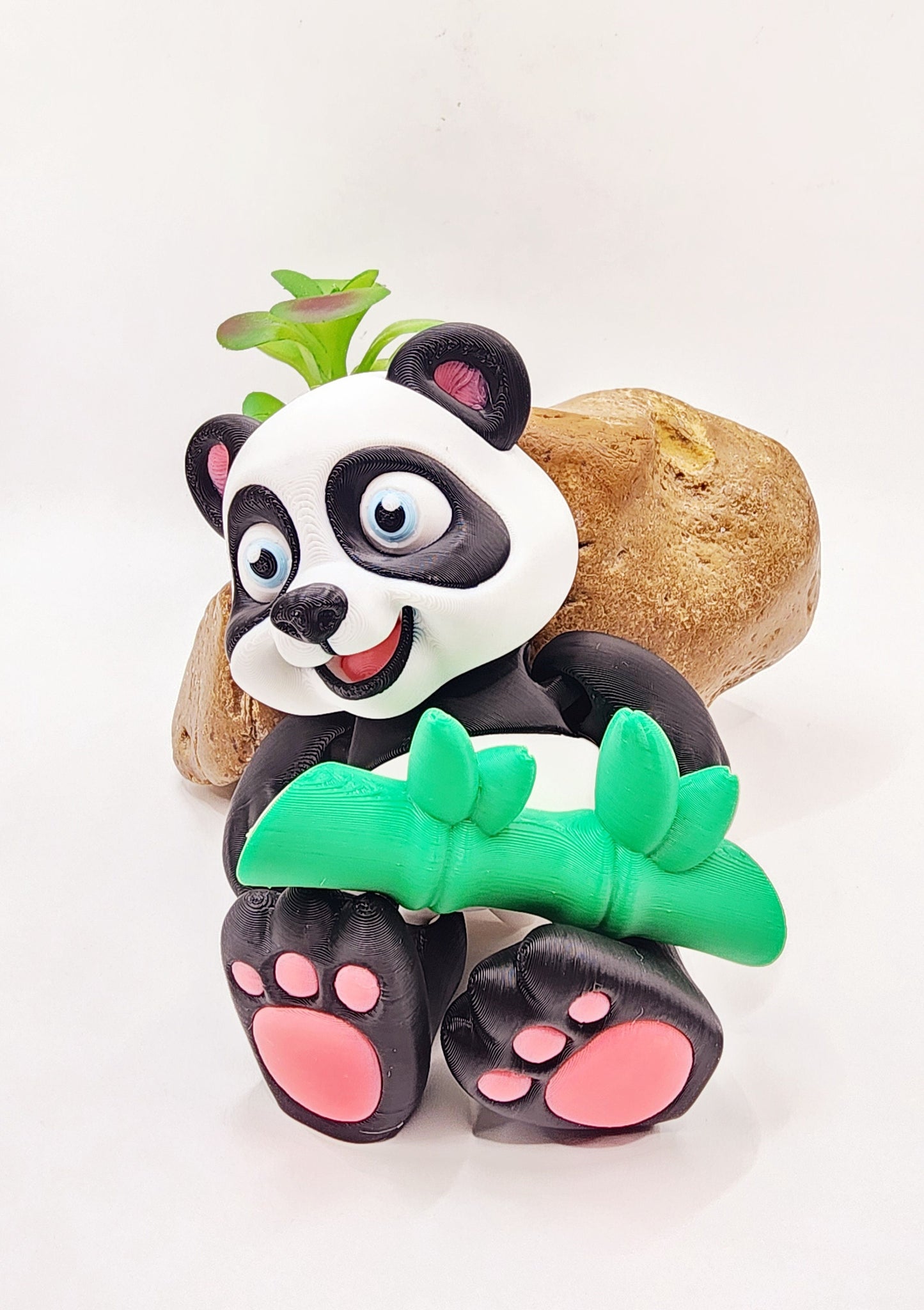 3D Printed articulated flexi baby Panda with bamboo fidget desk toy.