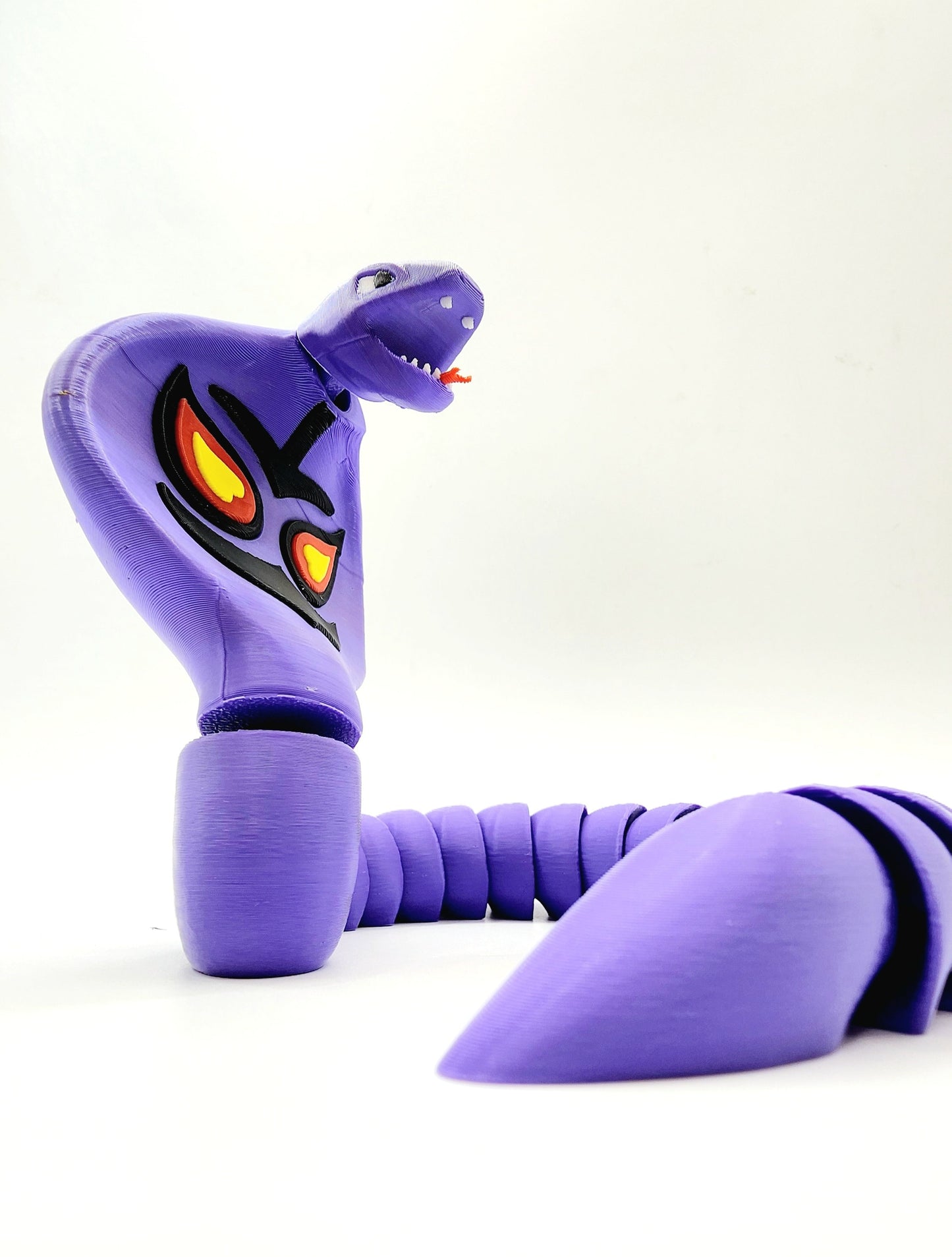 3D printed pokemon Arbok. Articulated fidget, sensory, desk toy.