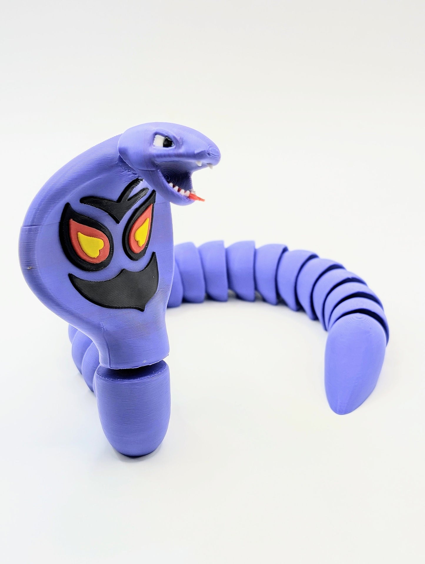 3D printed pokemon Arbok. Articulated fidget, sensory, desk toy.