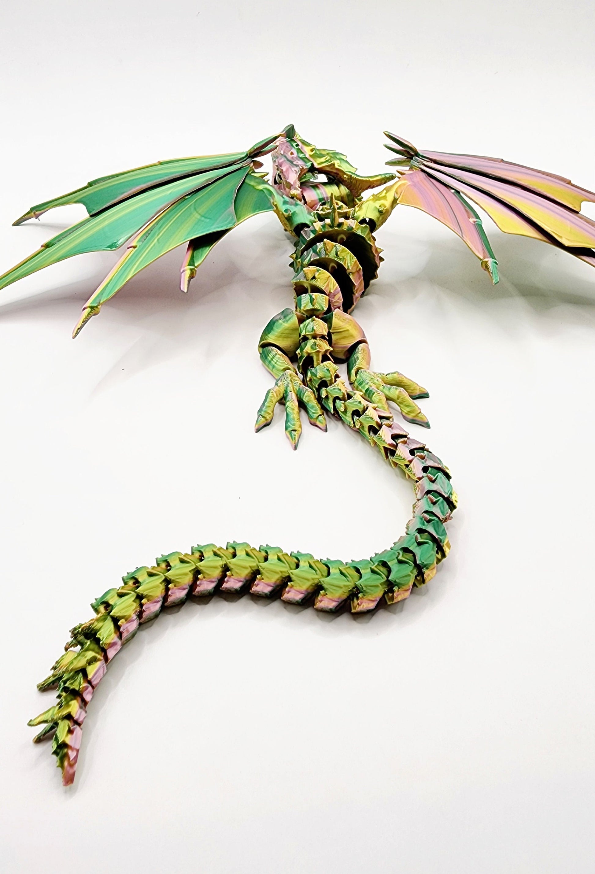 3D printed Biting Dragon articulated fidget, sensory toy. With a snap biting mouth.