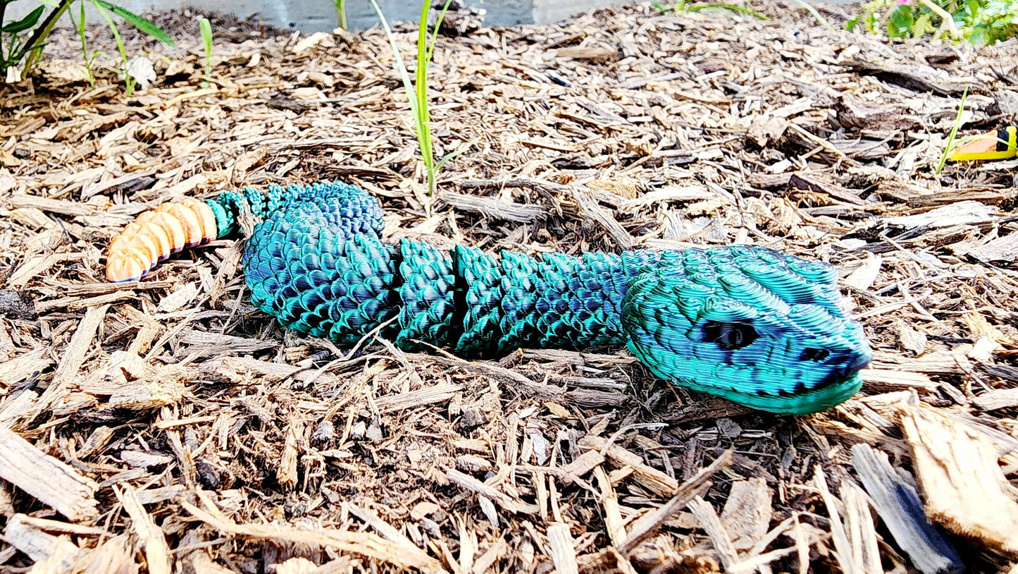 3D printed articulated rattlesnake fidget, sensory toy, desk toy.