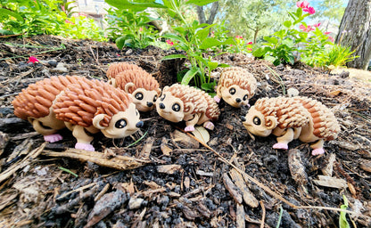 3D printed cute articulate hedgehog fidget toy.