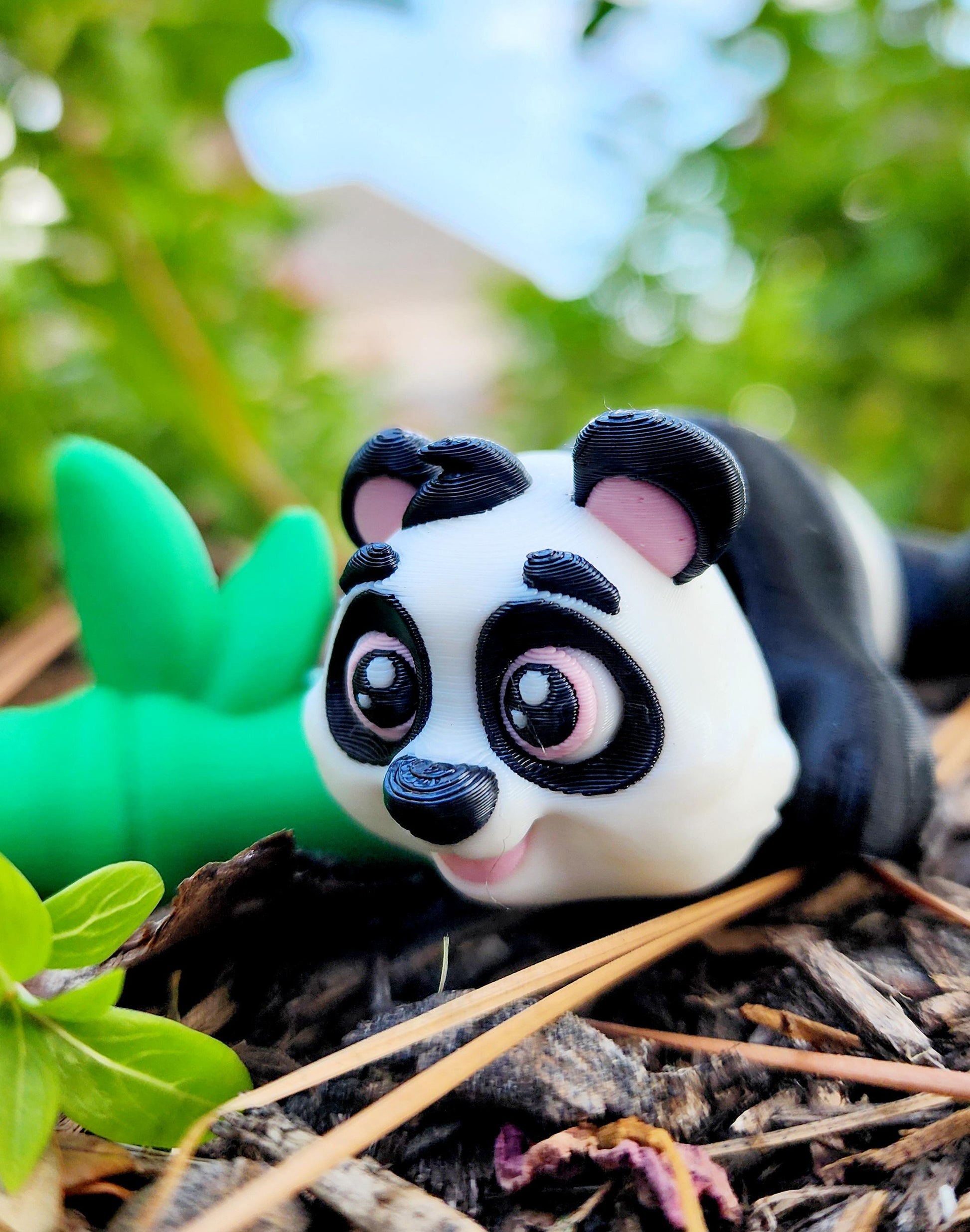 3D printed articulated mini-Panda with bamboo fidget, sensory toy.