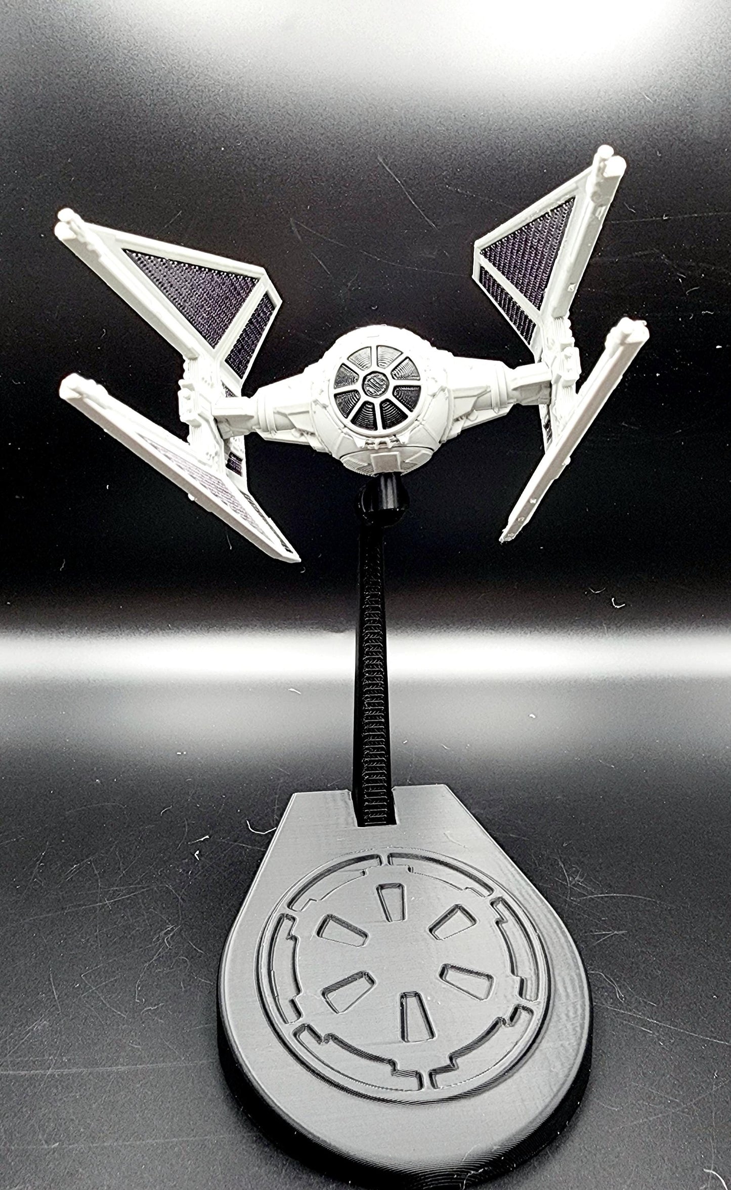 3D Printed Tie Fighters from Star Wars with display base. Fan art