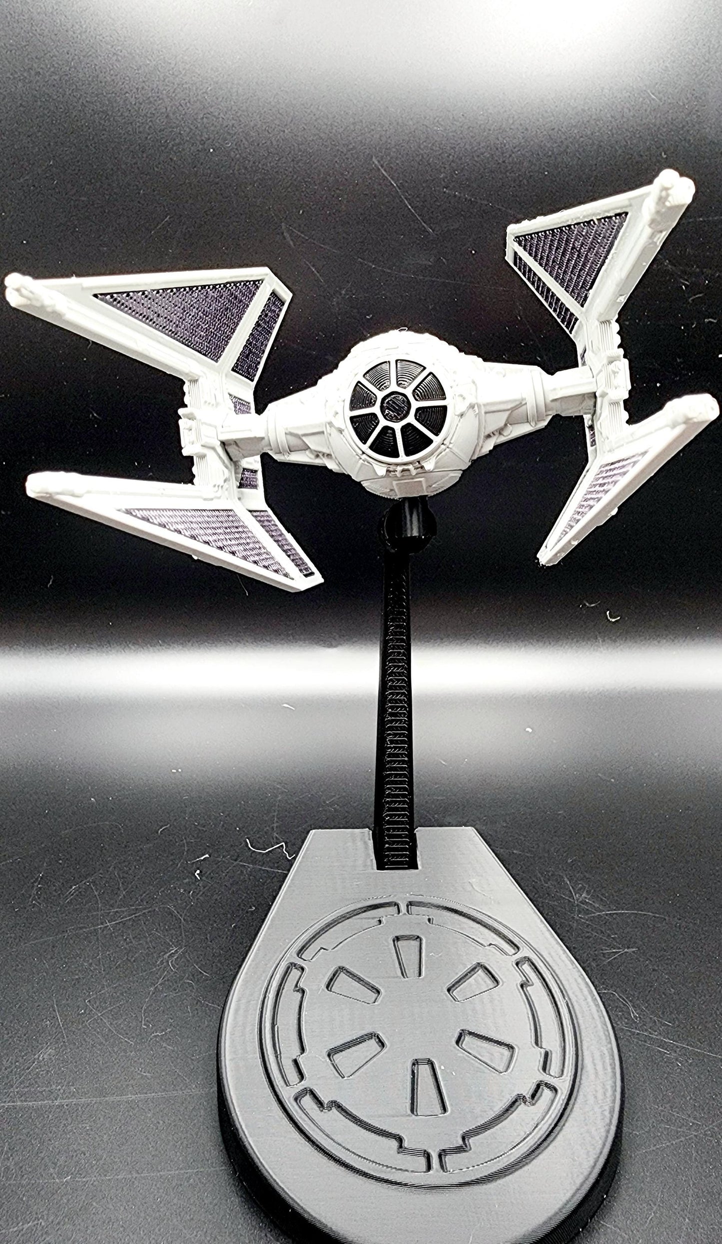 3D Printed Tie Fighters from Star Wars with display base. Fan art