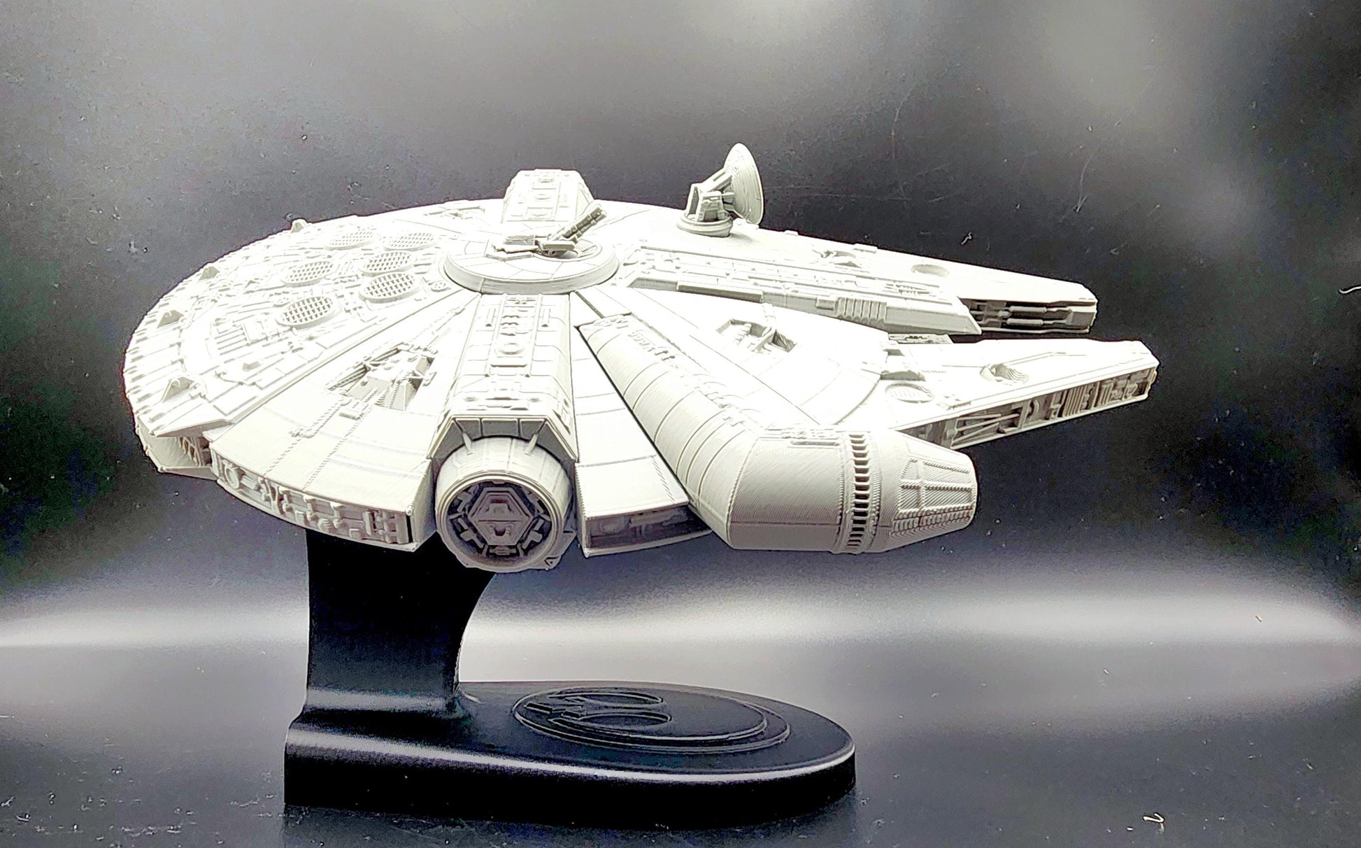 3D Printed Milennium Falcon with articulate stand. Action Figure, Desktop Toy, Decoration. Fan Art.