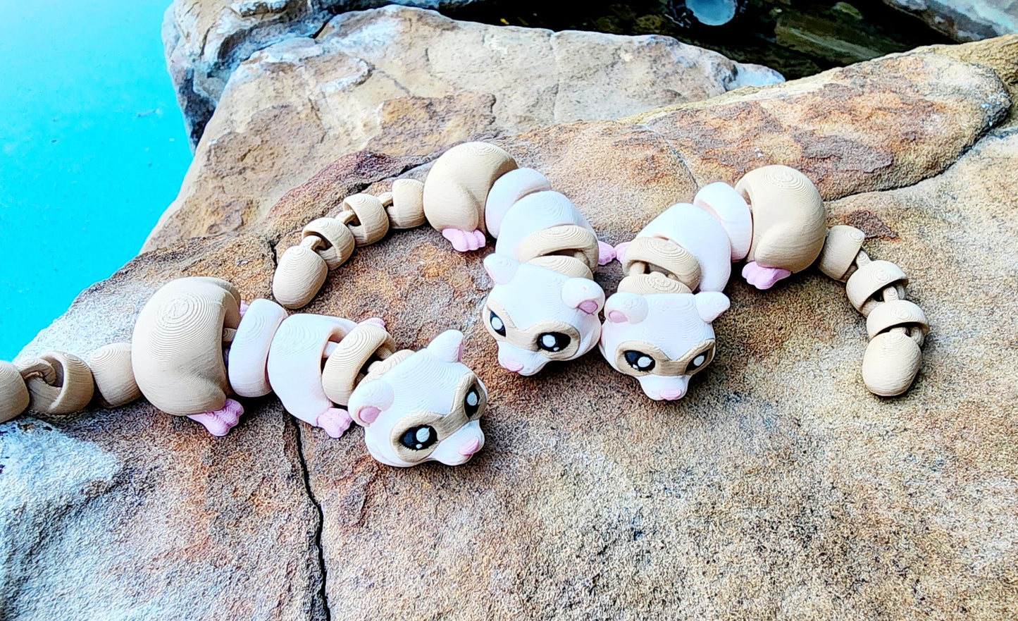 3D printed articulated Ferret fidget toy, sensory toy.