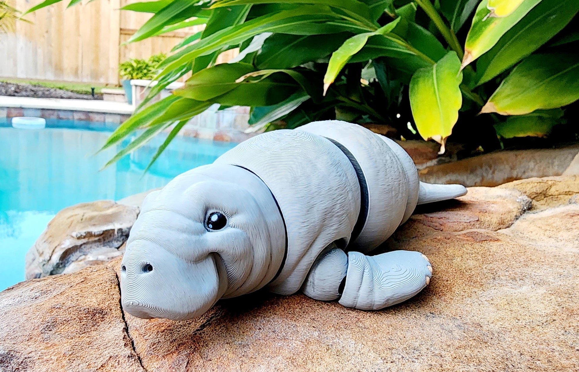 3D printed articulated Manatee fidget, sensory toy, desk toy.