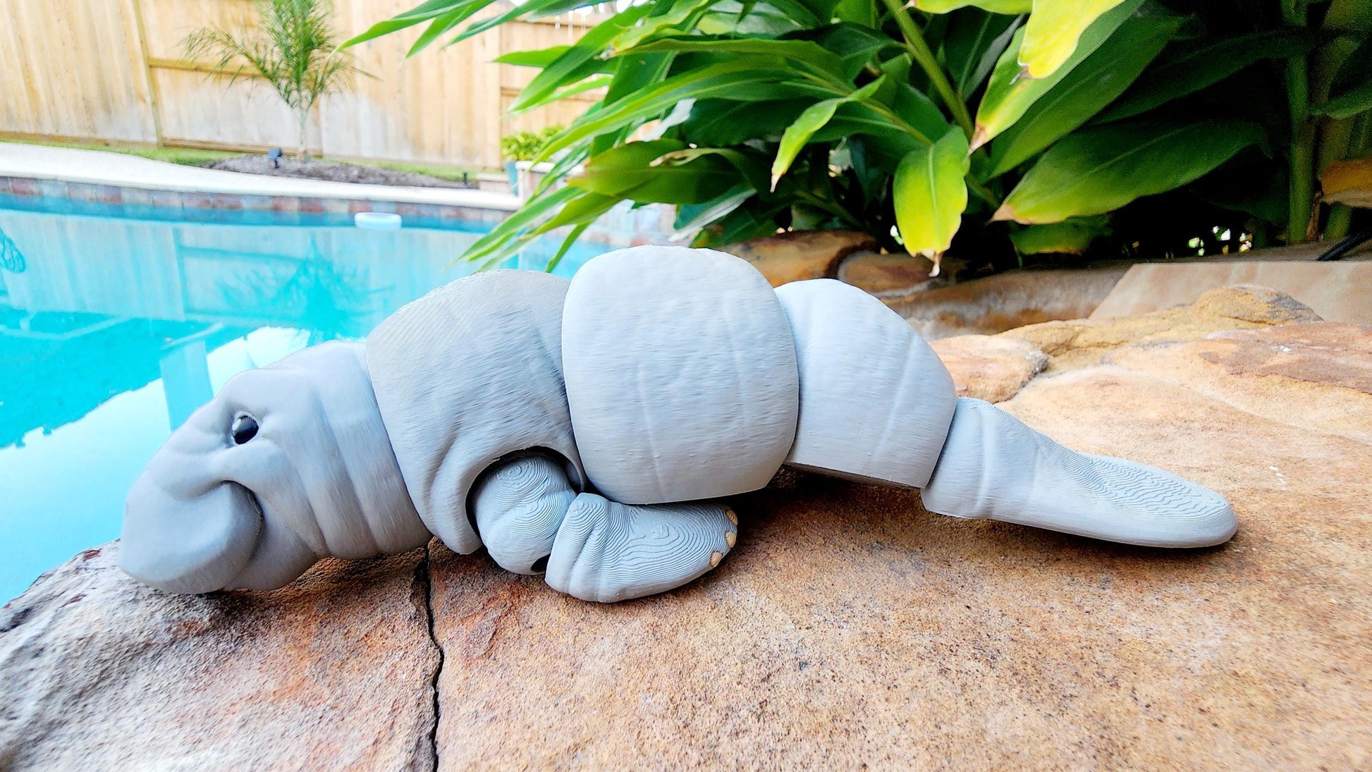 3D printed articulated Manatee fidget, sensory toy, desk toy.