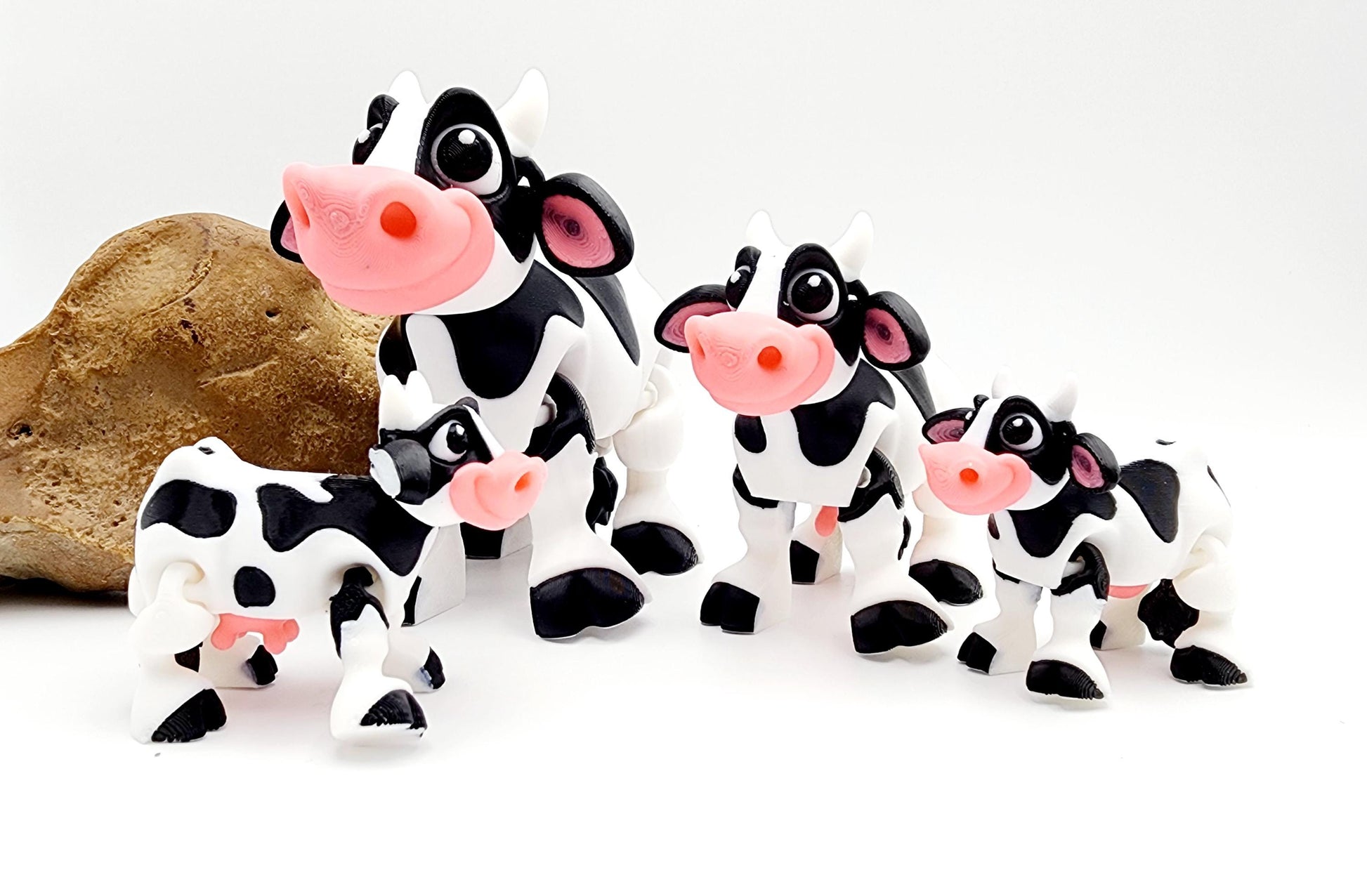 3D printed Milk cow articulated fidget toy. Sensory toy, desk toy.