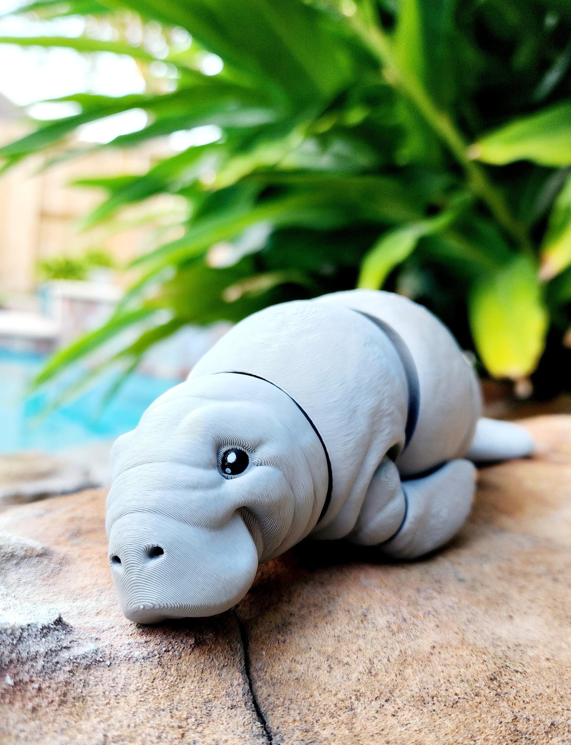 3D printed articulated Manatee fidget, sensory toy, desk toy.