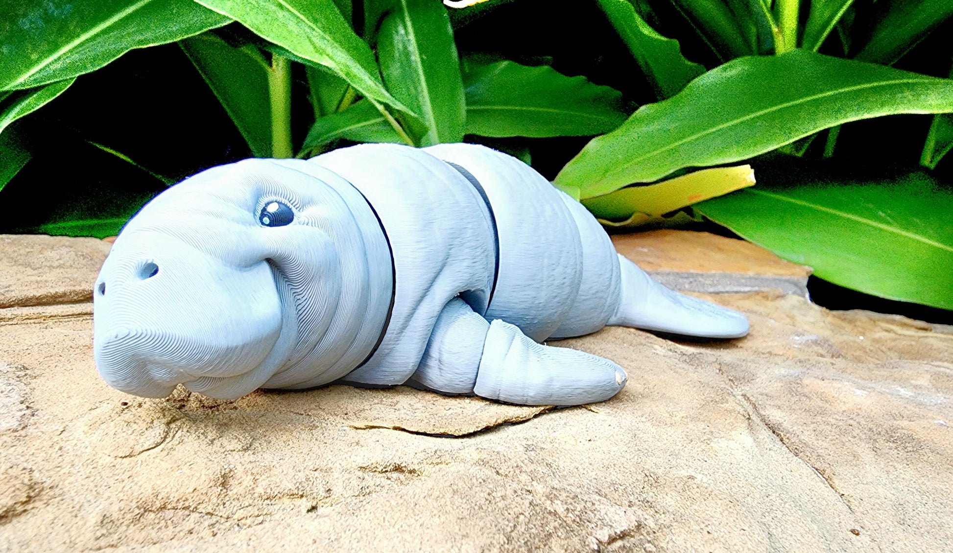 3D printed articulated Manatee fidget, sensory toy, desk toy.