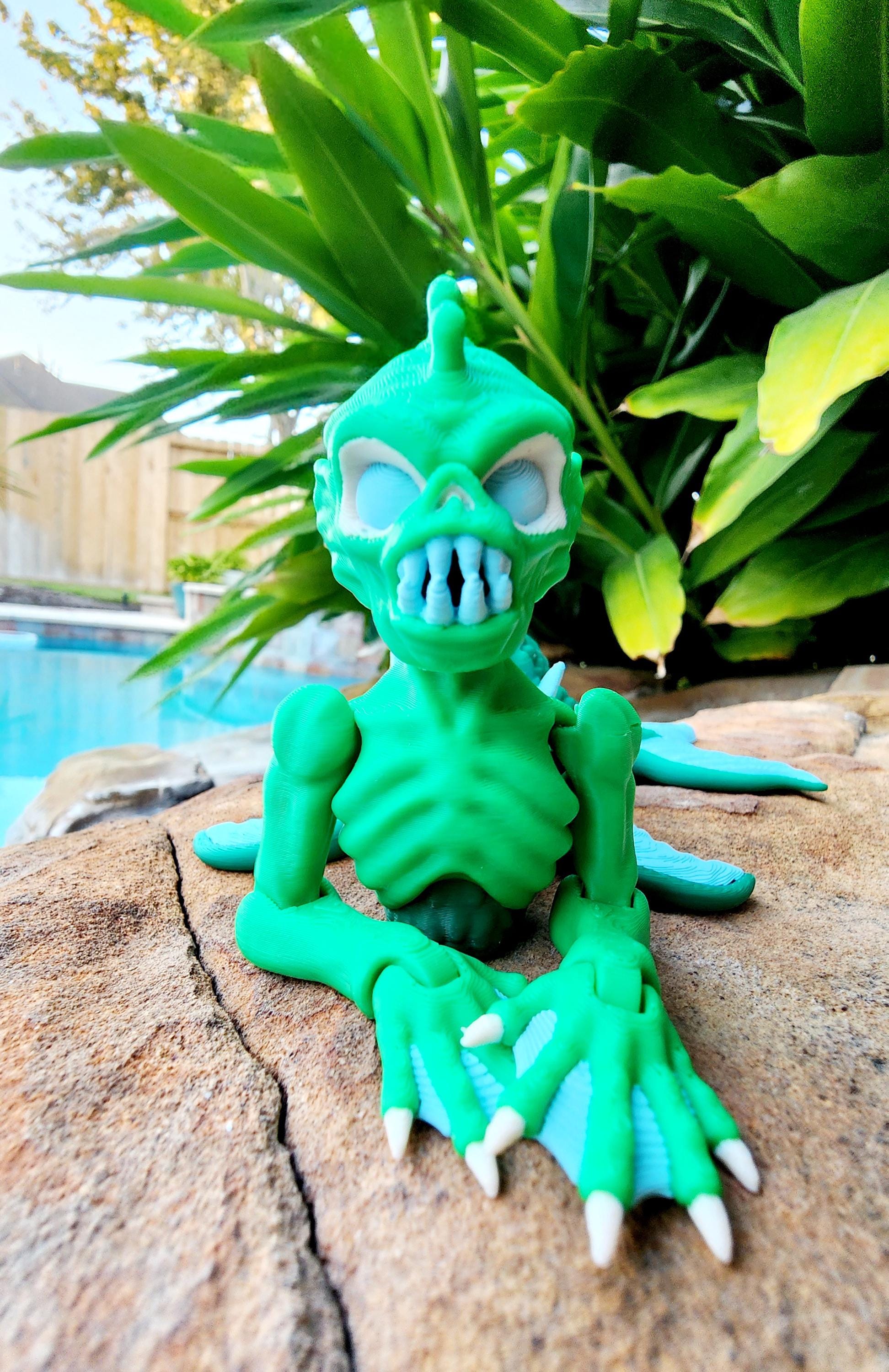 3D printed articulate Fiji Mermaid fidget, sensory toy.