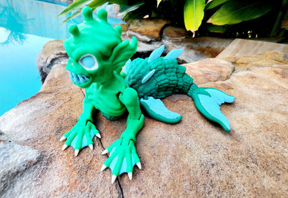 3D printed articulate Fiji Mermaid fidget, sensory toy.