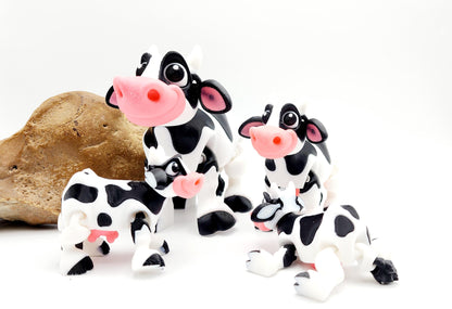 3D printed Milk cow articulated fidget toy. Sensory toy, desk toy.