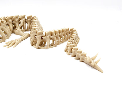 3D printed articulate posable skeleton dragon fidget, sensory toy.