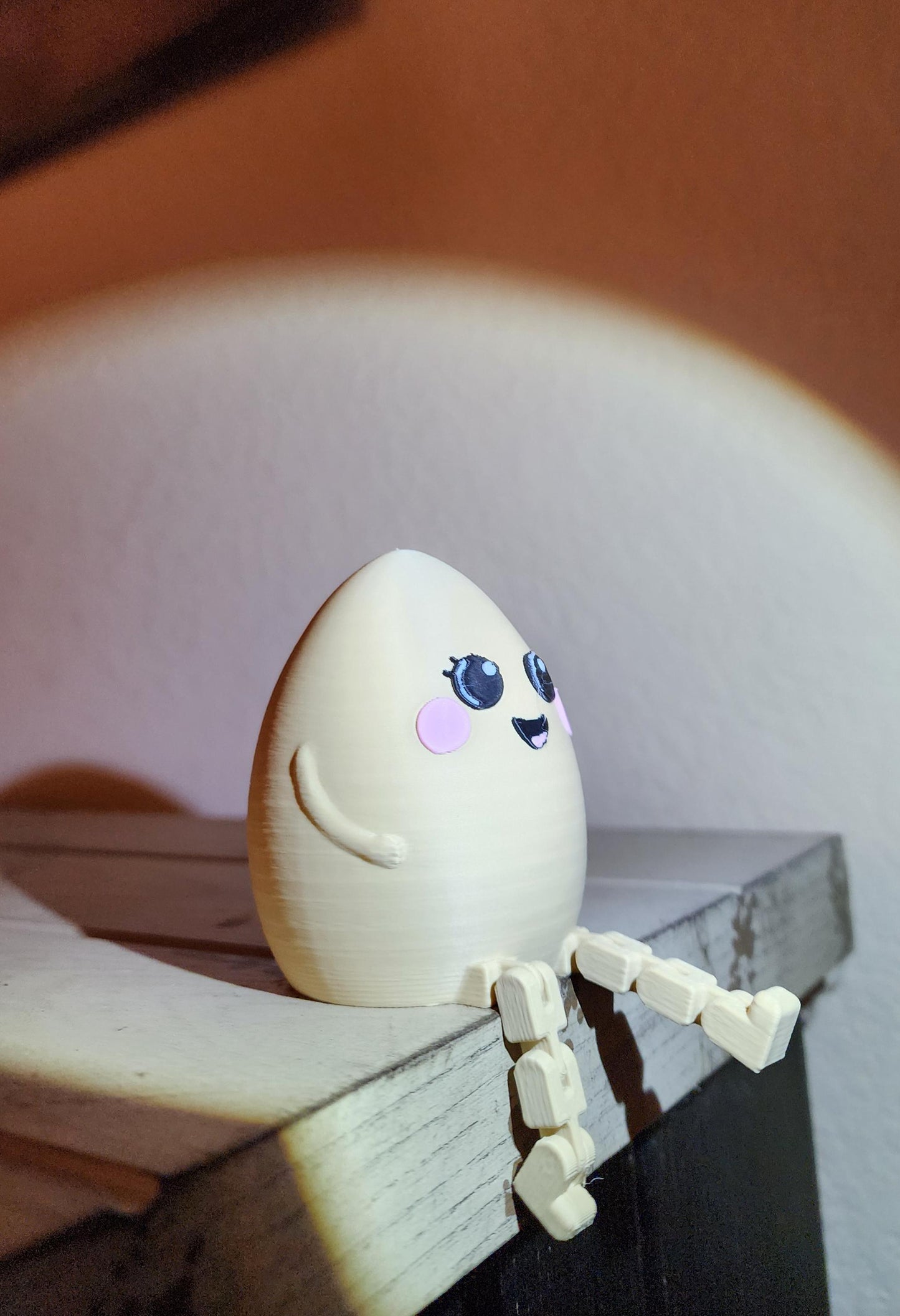 3D printed articulate Smiley easter egg with rainbow Swing.