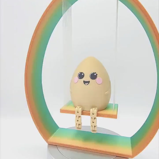 3D printed articulate Smiley easter egg with rainbow Swing.