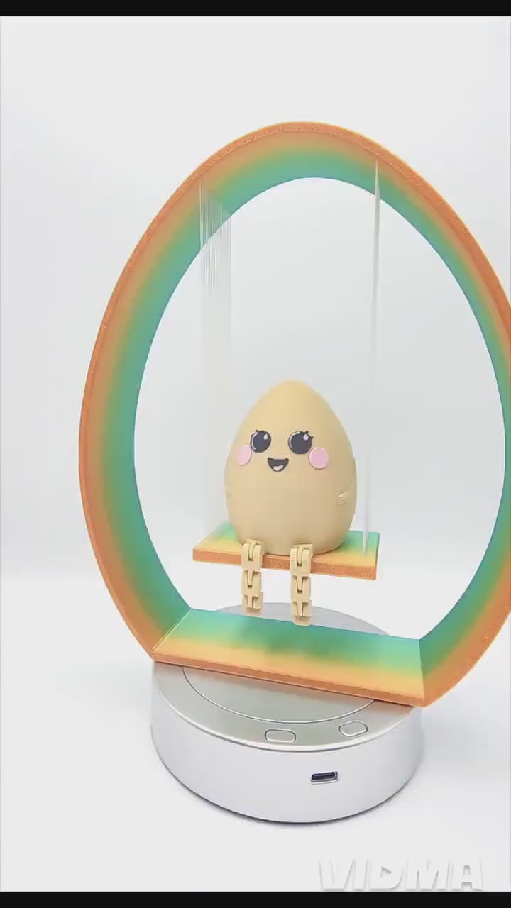 3D printed articulate Smiley easter egg with rainbow Swing.