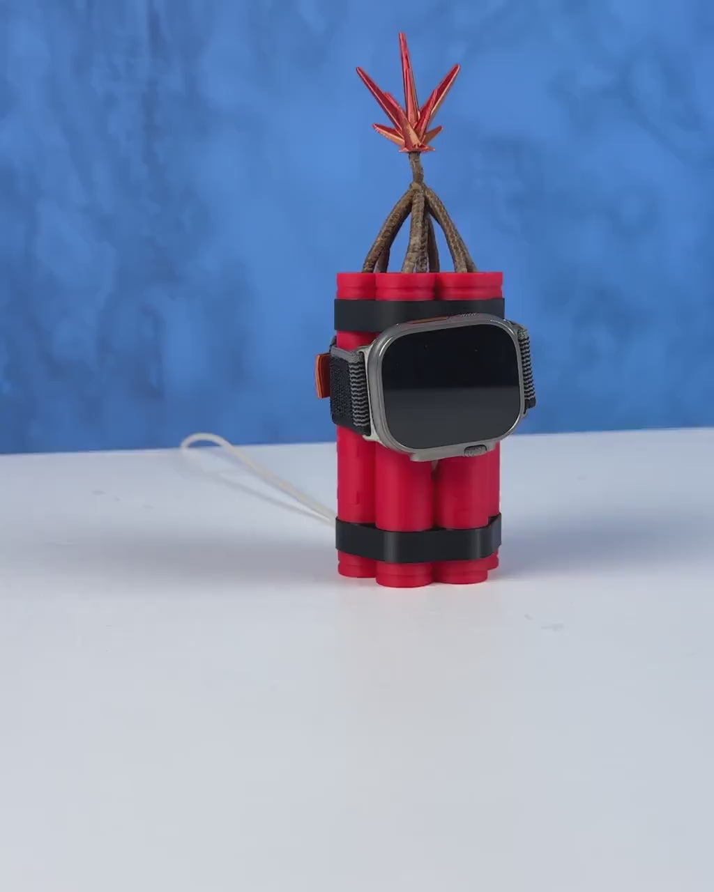 3D printed Dynamite Apple Watch charger stand.